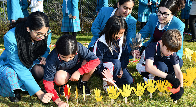 Students from both Mother Teresa Catholic Primary School Westmead and Catherine McAuley participating in reconciliation week