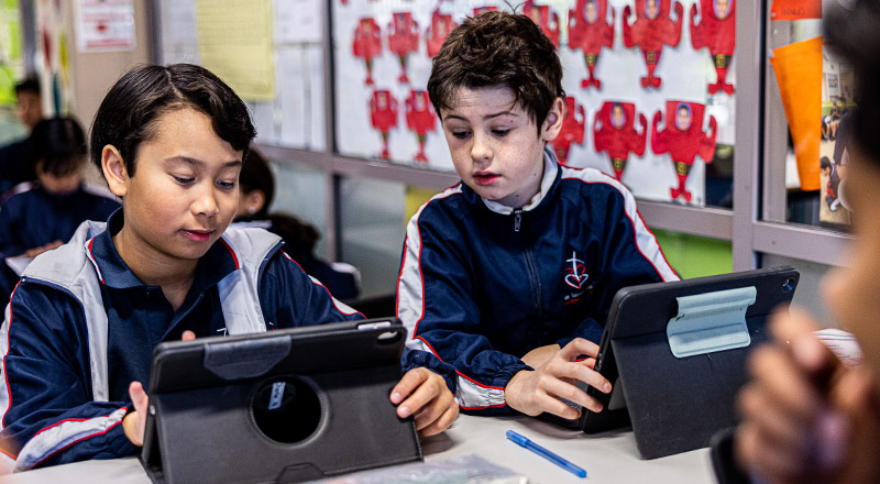 Students on iPads at Mother Teresa Catholic Primary School Westmead