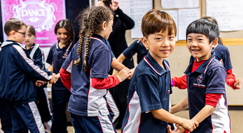 Students holding hands at Mother Teresa Catholic Primary School Westmead