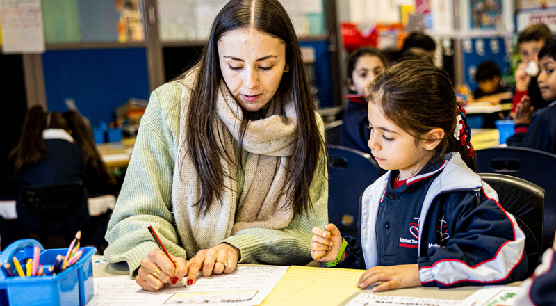 Dedicated teacher and student from Mother Teresa Catholic Primary School Westmead