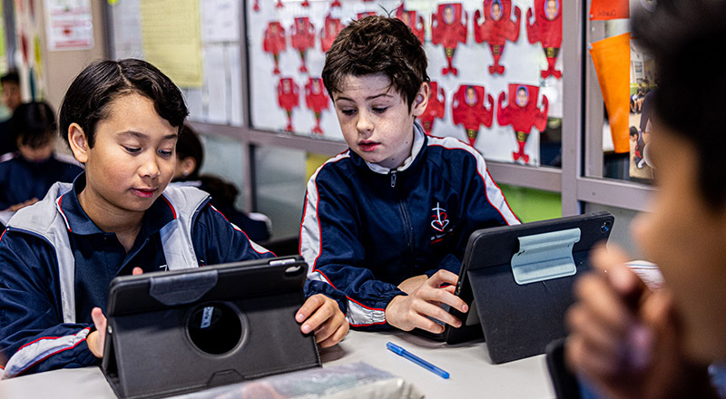 Students collaborating at Mother Teresa Catholic Primary School Westmead