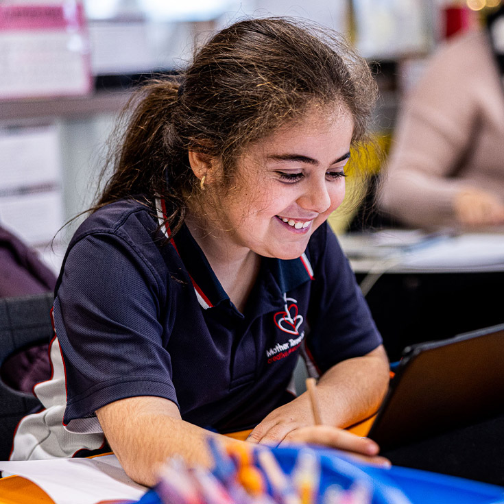 Beaming student from Mother Teresa Catholic Primary School Westmead