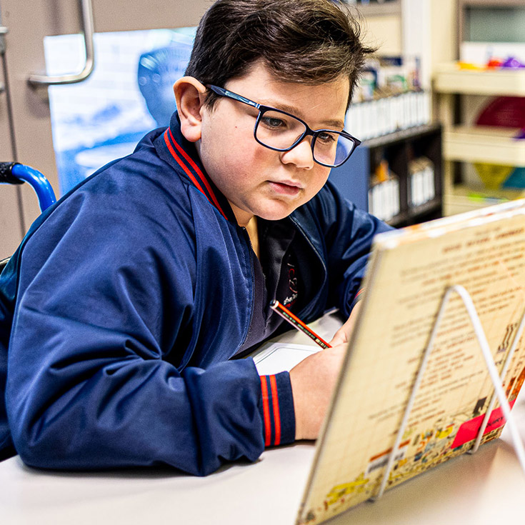 Student reading at Mother Teresa Catholic Primary School Westmead