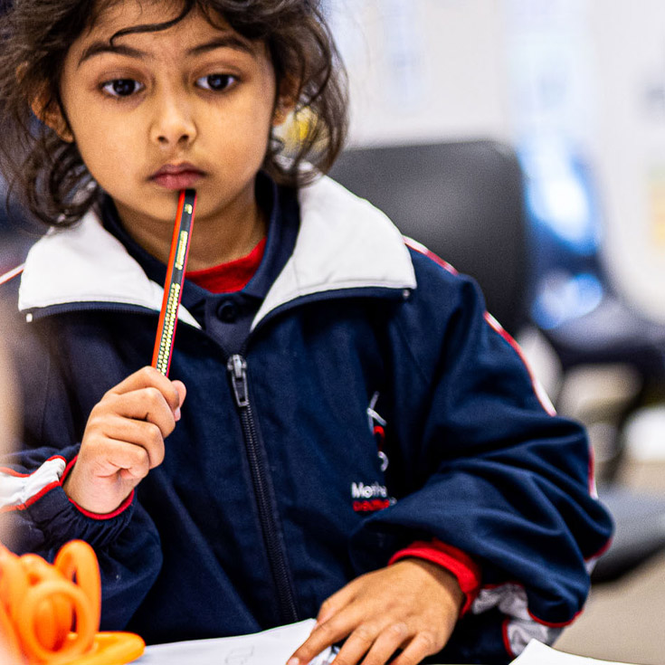 Student thinking quizzically at Mother Teresa Catholic Primary School Westmead
